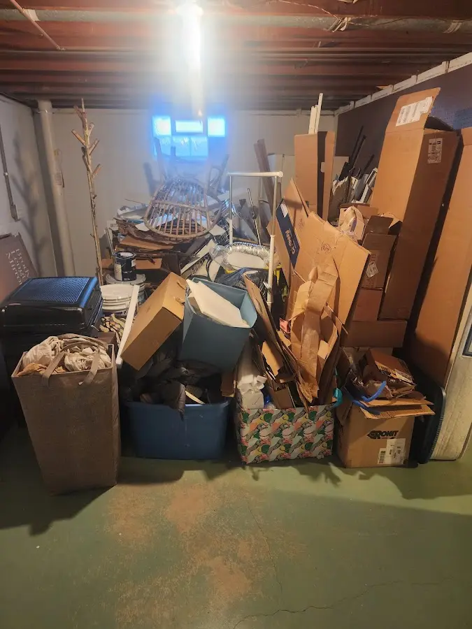 Roll-off dumpster container at job site for 6 Yard Dumpster Rental in Madison